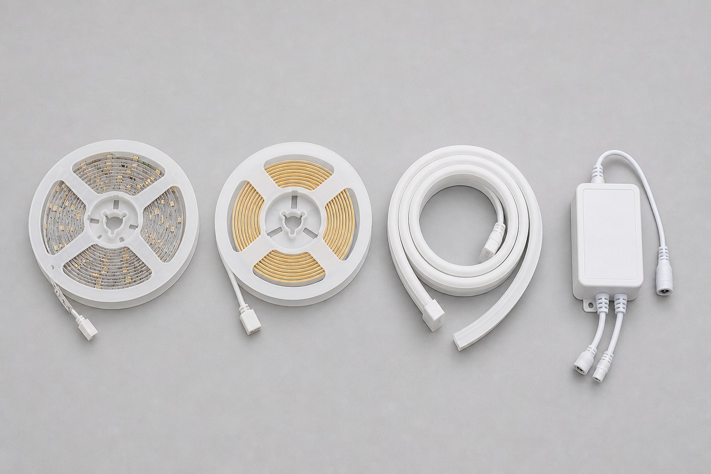 Four different LED strip product categories arranged in a row: SMD reel, COB reel, neon flex coil, controller box.