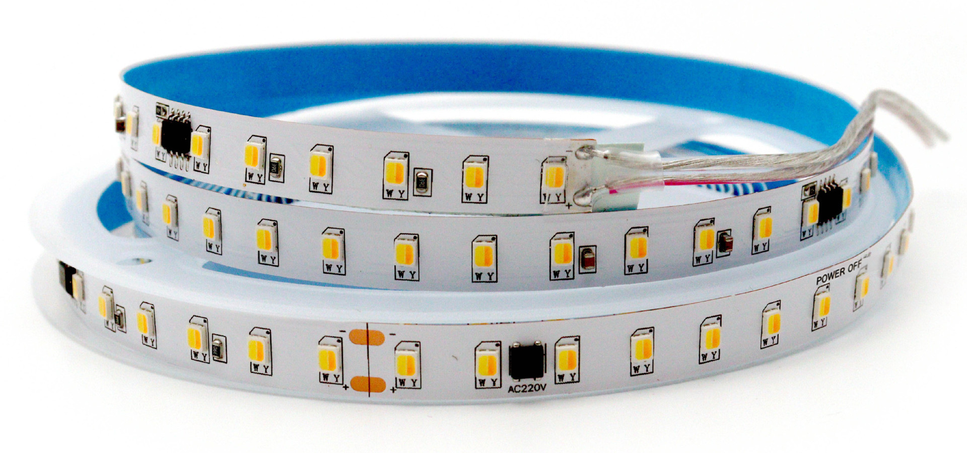 Transparent paired leads soldered to the LED strip end
