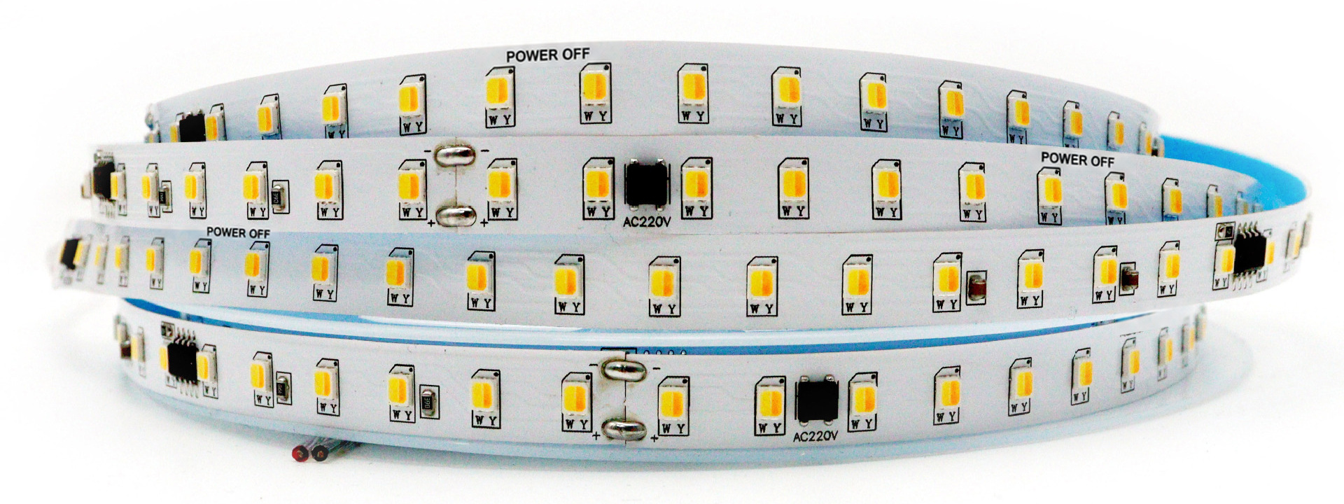 Copper pads and soldered joints on the coiled three-white-mode LED strip