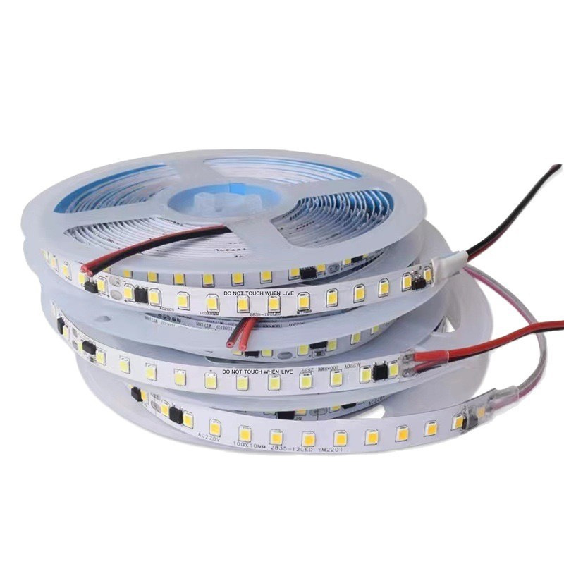 Adhesive-backed 220V LED strip reels with power leads