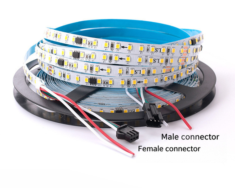Male and female three-wire connectors on a chasing LED strip reel.