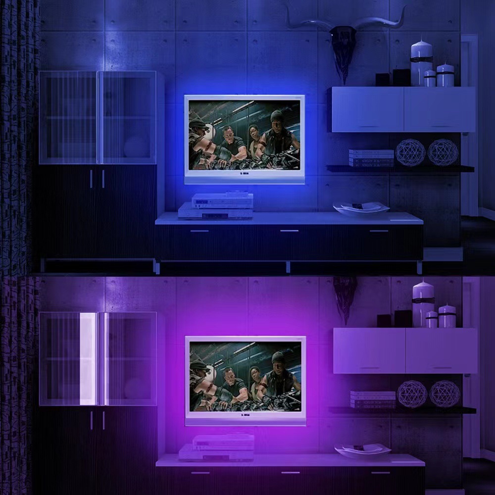 The same television room with blue and purple accent lighting