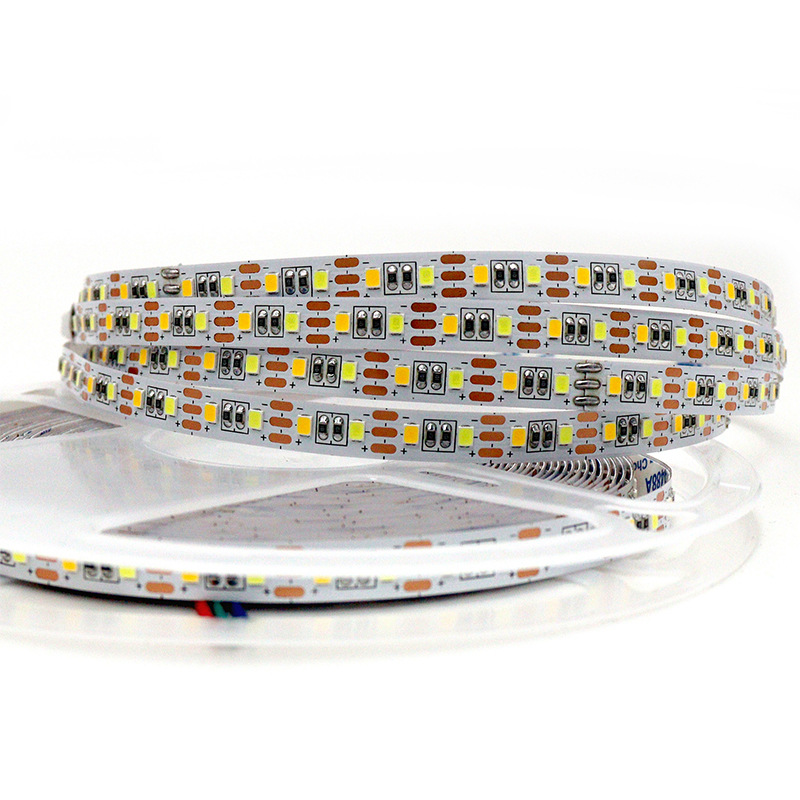 Dual-white SMD strip reel with three-channel solder pads.
