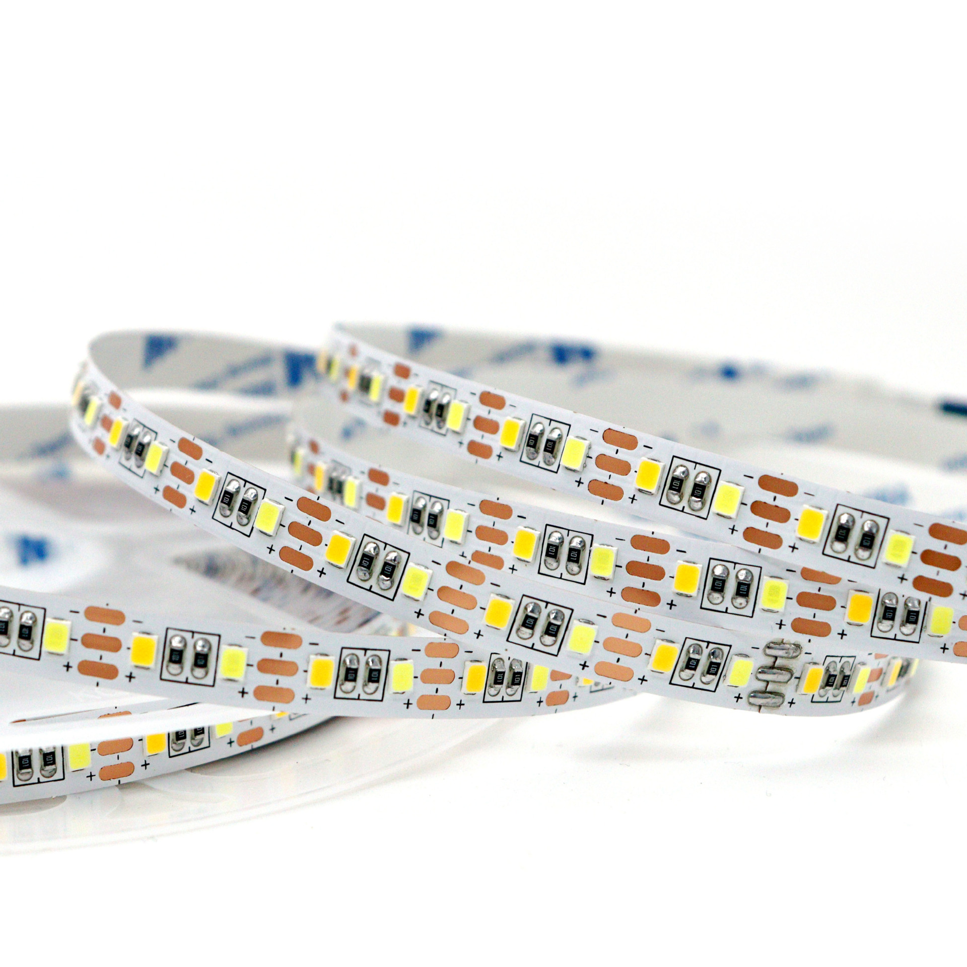 Three solder pads and cut marks on the dual-white strip.