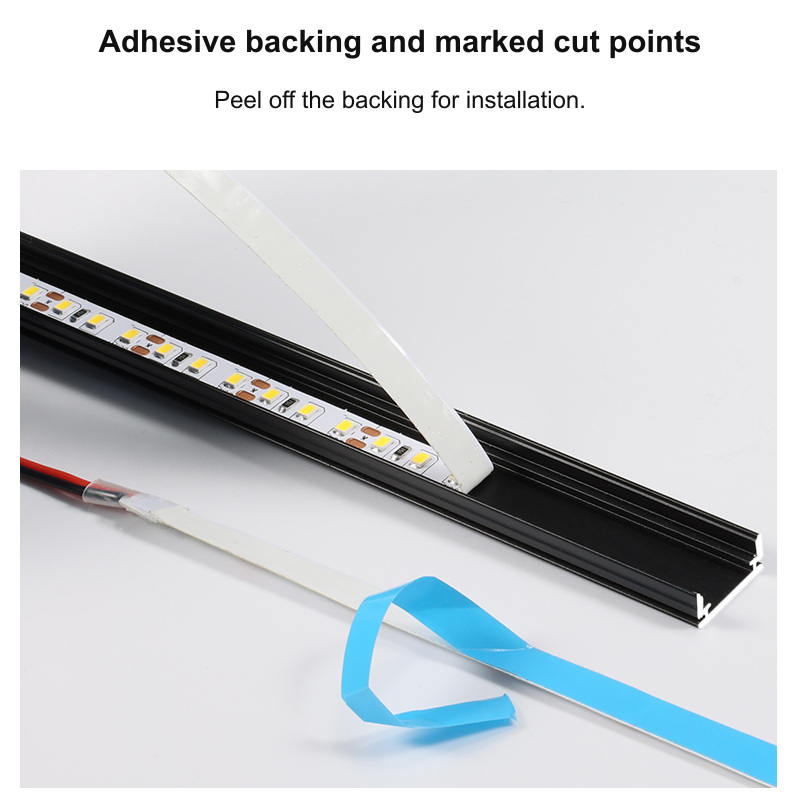 LED strip fitted in a channel, showing peel-off adhesive backing.