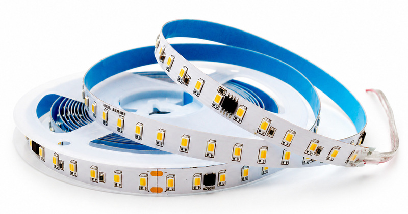 Dual-white strip reel with blue adhesive backing and connection leads.