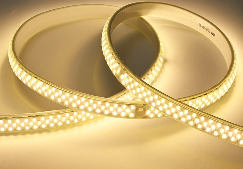 Warm-white dense strip arranged in curves.