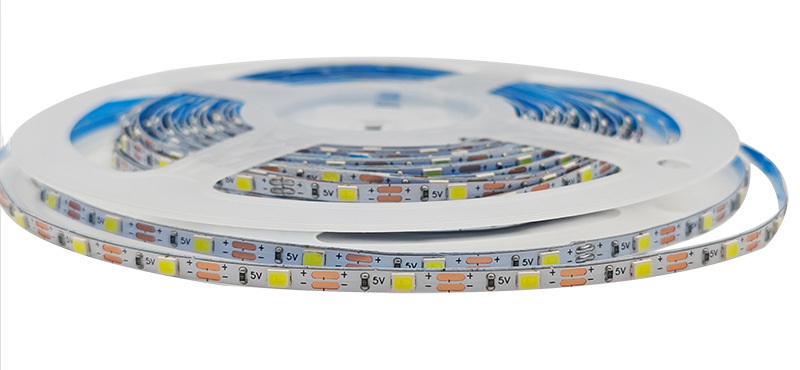 Narrow 5 V LED strip wound on a reel.