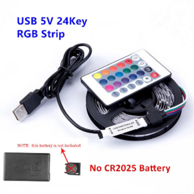 Black-PCB RGB strip reel with a USB controller and 24-key remote.