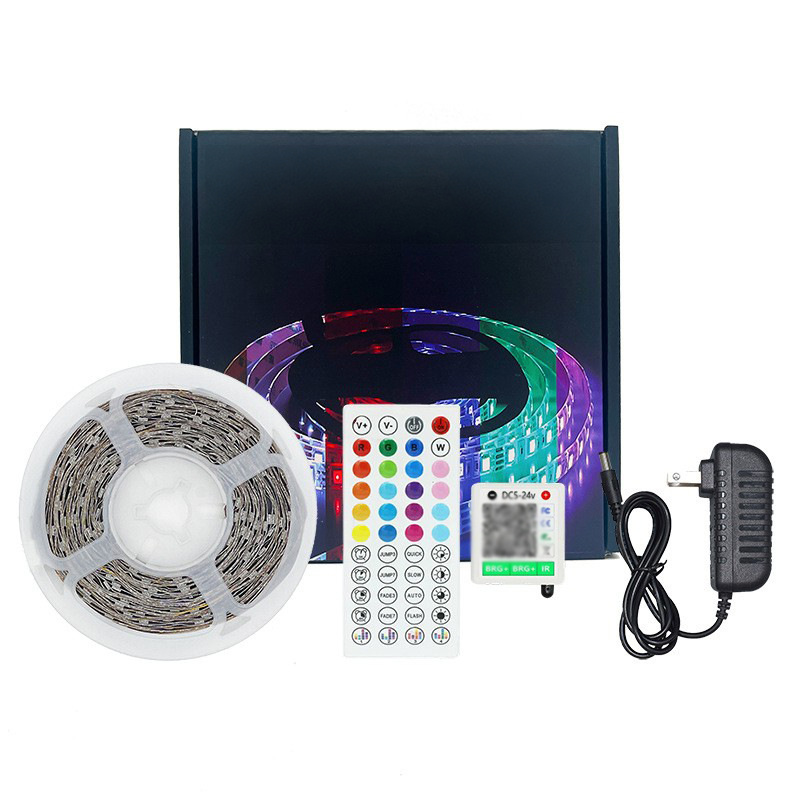 RGB strip reel with 44-key remote, controller and EU power adapter.