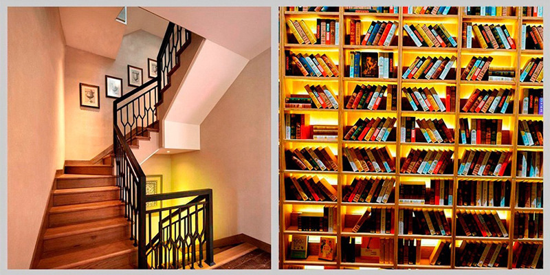 Warm-white strip lighting in stairs and a library.
