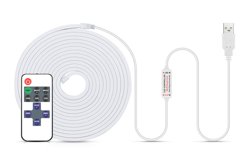 White COB strip with USB control lead and eleven-key remote.