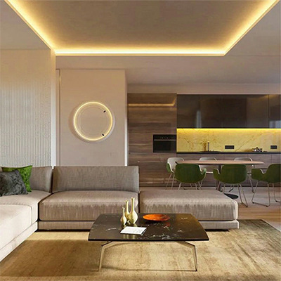 Warm-white ceiling-cove lighting in a living room.