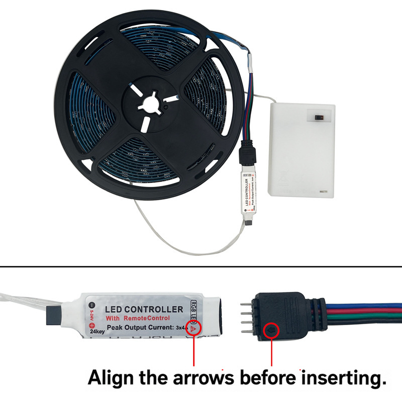 Battery-powered RGB strip and four-pin connector arrow alignment.