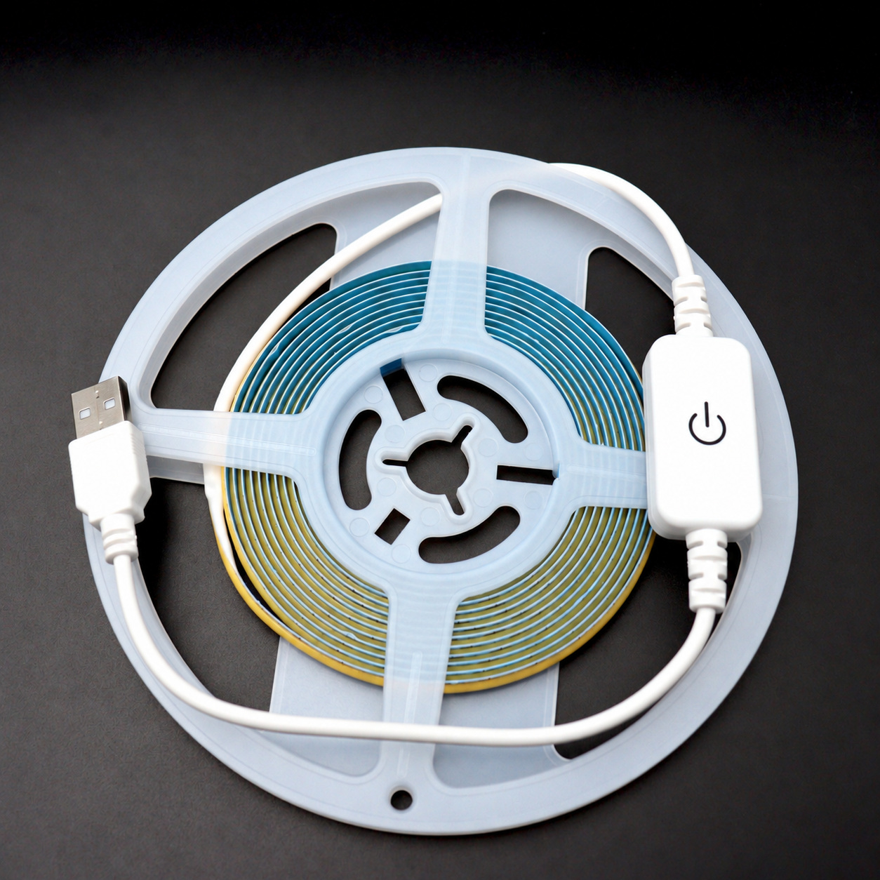 COB strip reel with USB lead and touch control.
