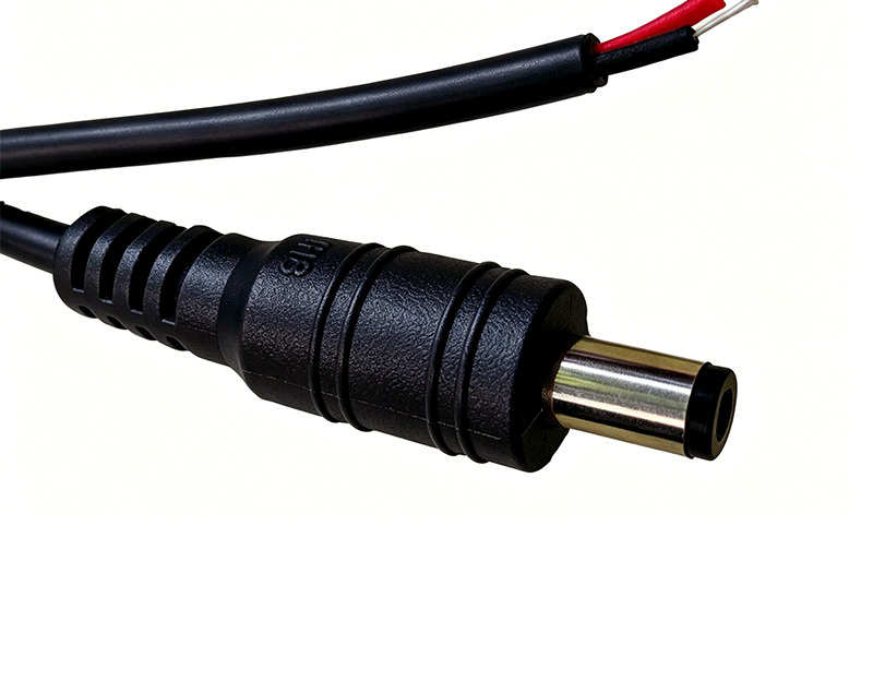 Black DC male connector lead with stripped conductors
