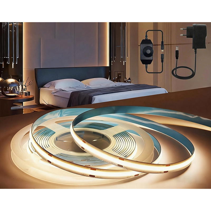 24V strip kit with rotary dimmer, power adapter and illuminated strip in front of a bedroom application backdrop