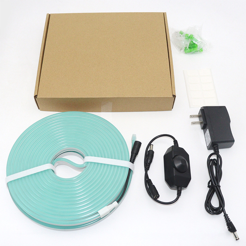 Ice-blue rotary-dimmer kit contents with neon flex, adapter, clips and packing box