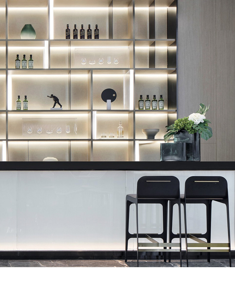 Warm shelf lighting in a modern cabinet and bar area