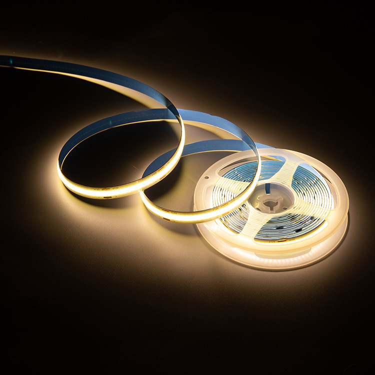White COB LED strip glowing on a dark background
