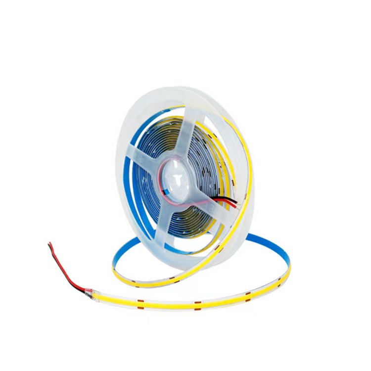 Flexible COB strip extending from a vertical reel