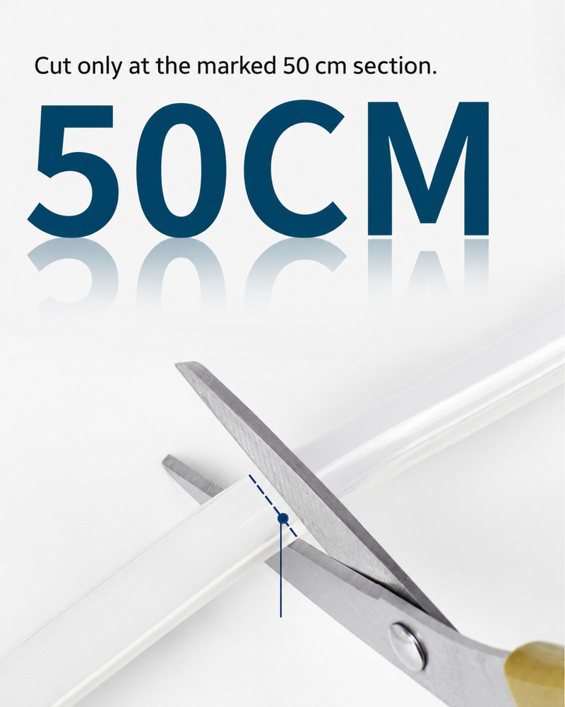 Scissors aligned with the marked 50 cm cut section